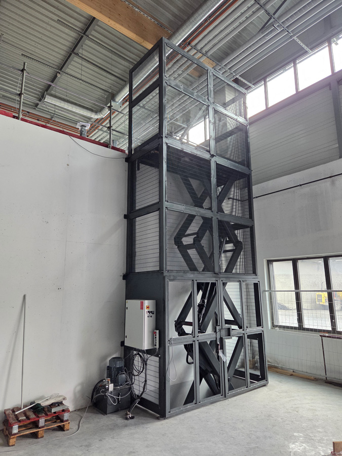 installation d'une gaine pour une table élévatrice pour le SMTC